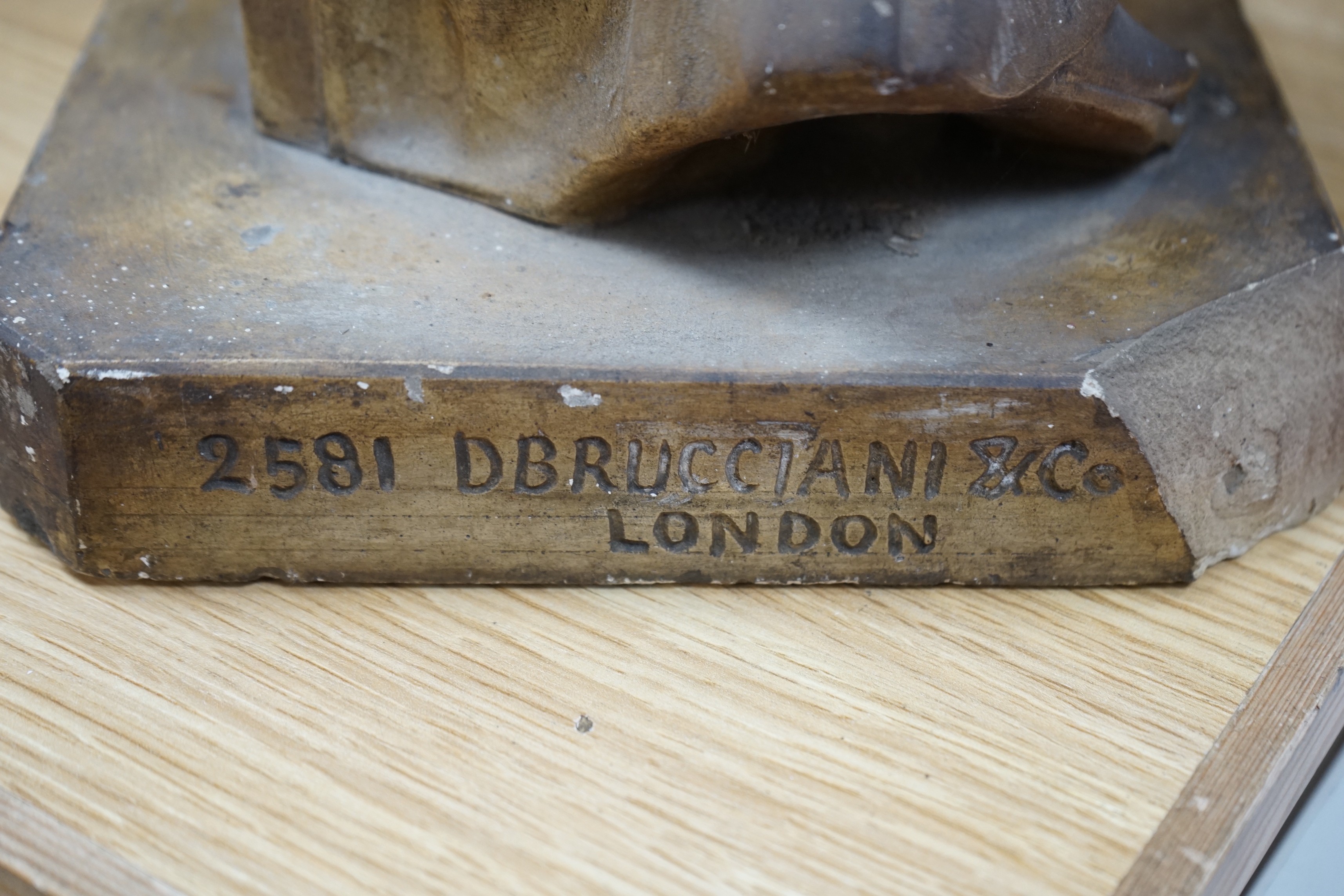 A plaster female figure, after the antique, inscribed ‘2581 D Brucciani & Co, London’ 70cm tall